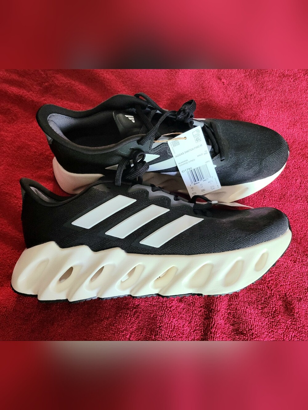 Adidas Switch FWD running shoes in core black and cloud white
